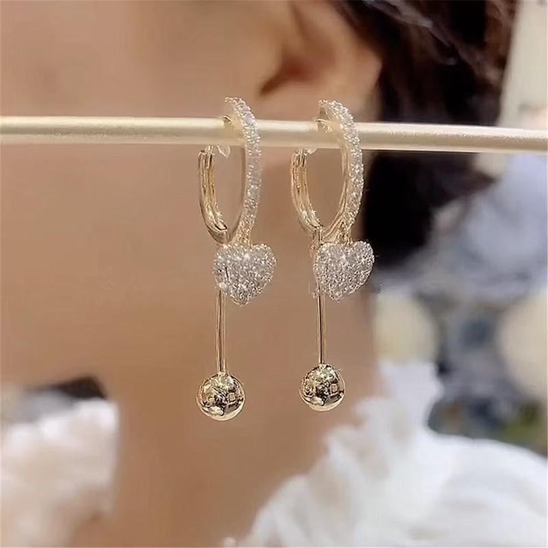 Discover the Elegance: Exquisite Light Luxury Zircon Heart Earrings for Women – Chic, Stylish Clip-On Design That Flatters Your Face